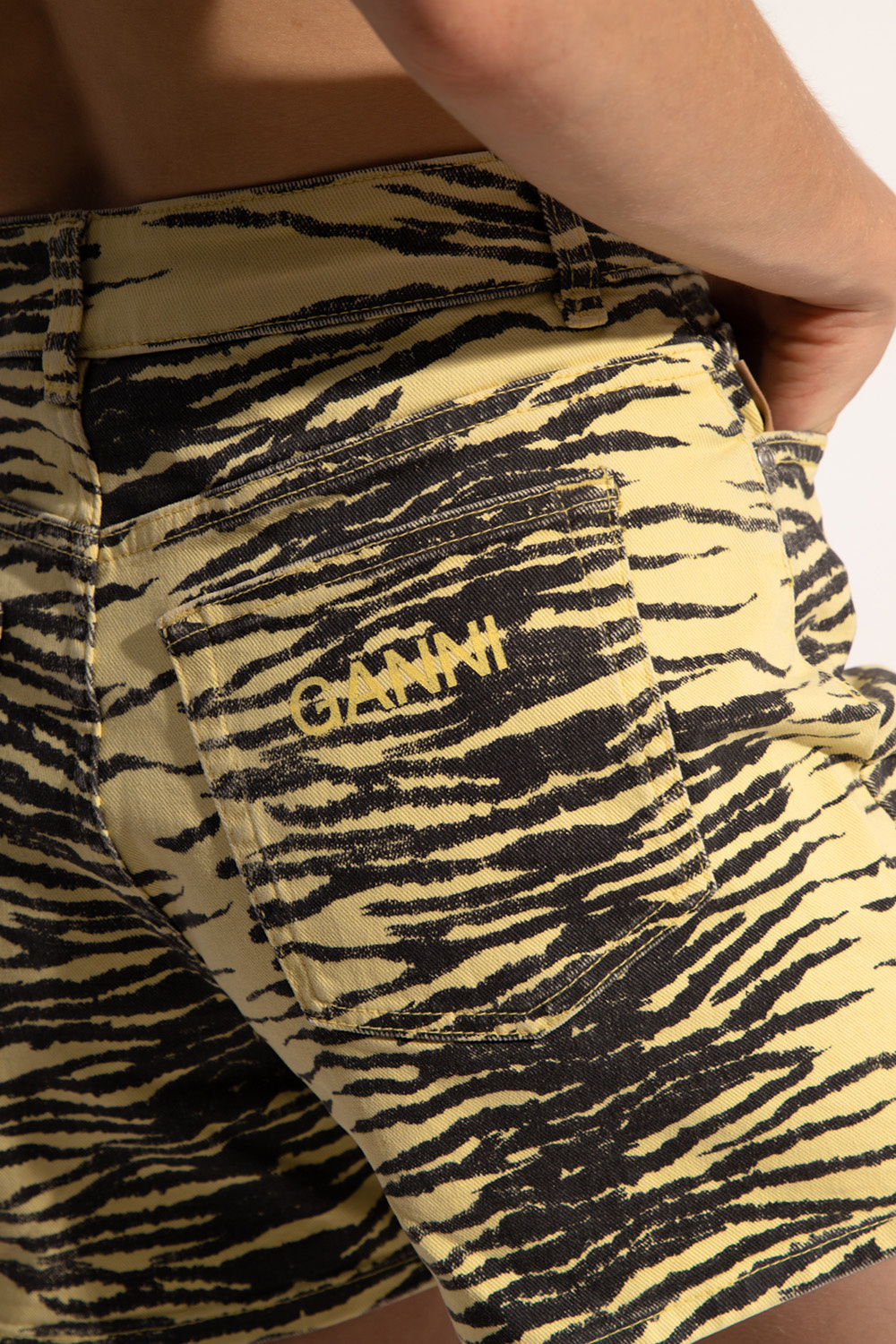 Yellow Shorts with animal motif Ganni
